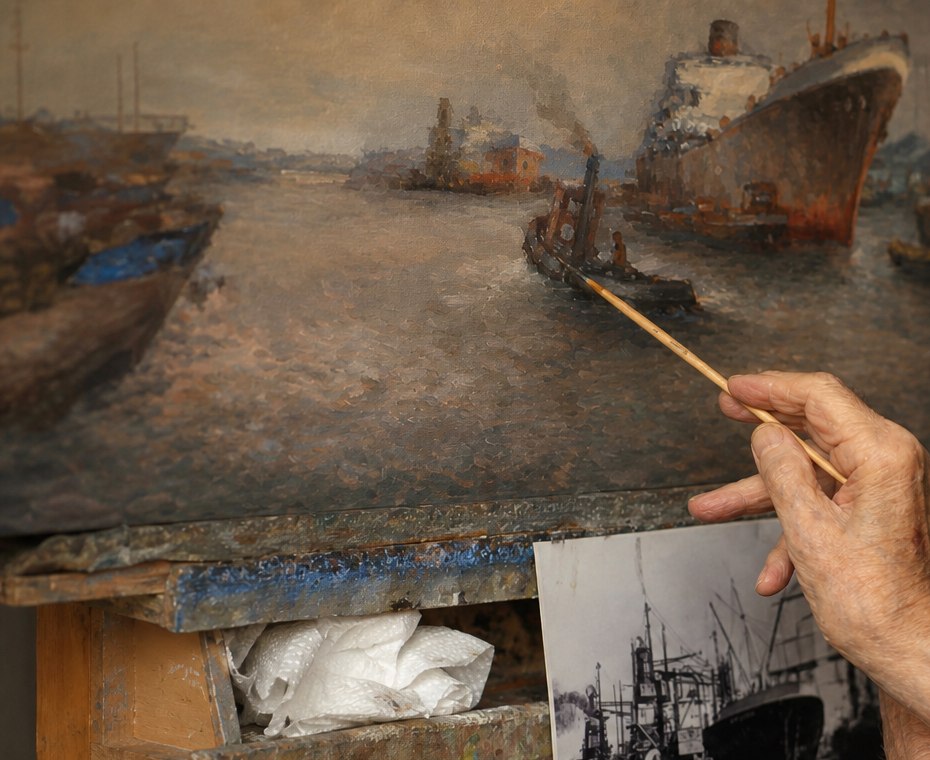 Atelierdetail met schilderij en kwast